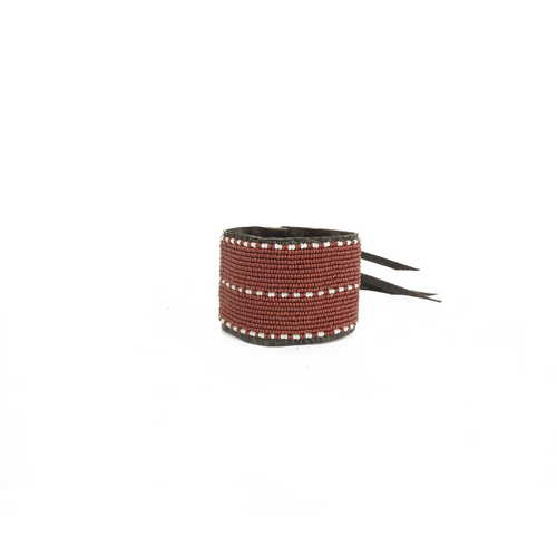 Black beaded bracelet with a strap on a white background